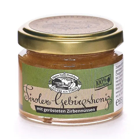 Alpine Tiroler Gebirgshonig mit gerösteten Zirbennüssen